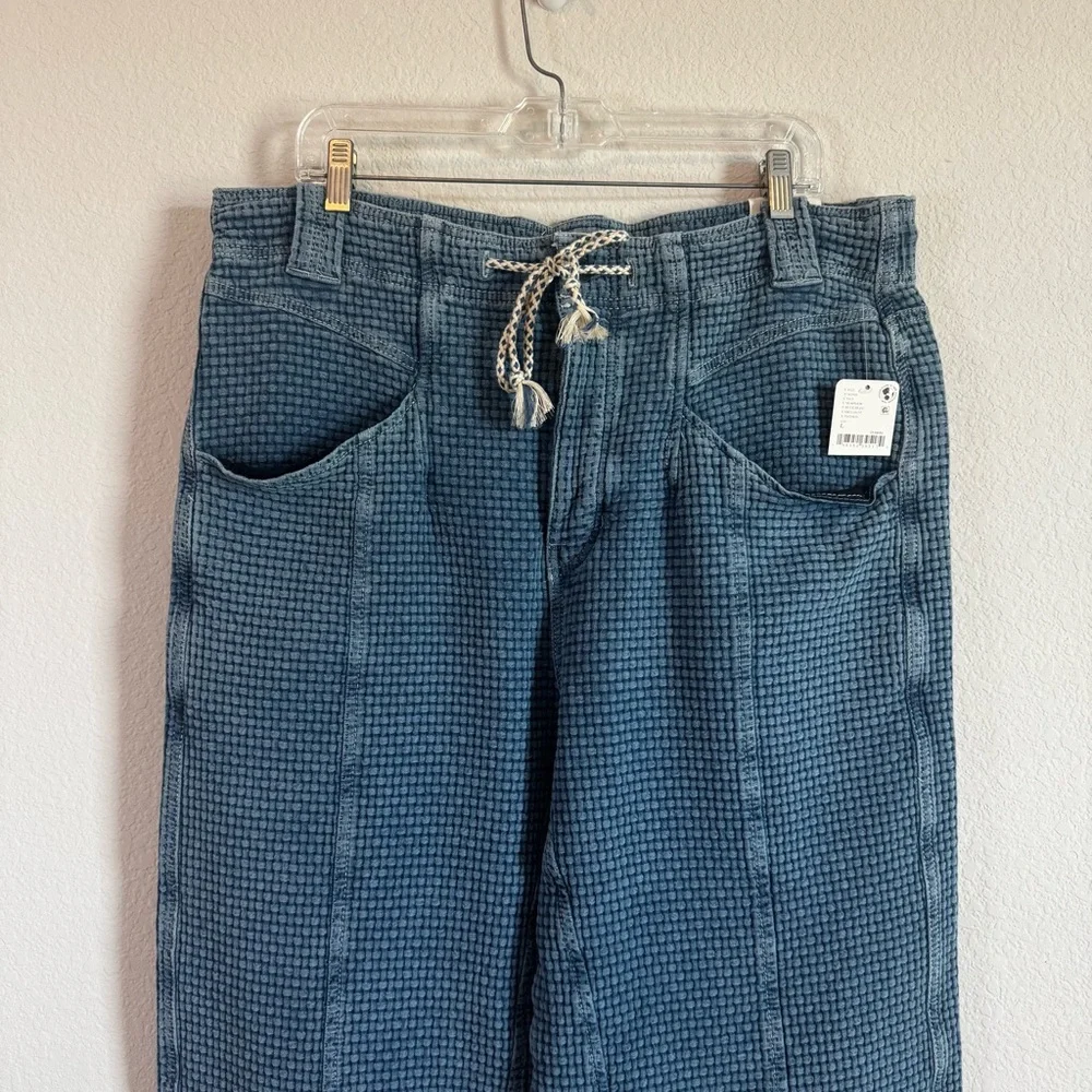 Free People We The Free Washed Away Textured Pull On Boyfriend
Jeans Size Large - Picture 3 of 14